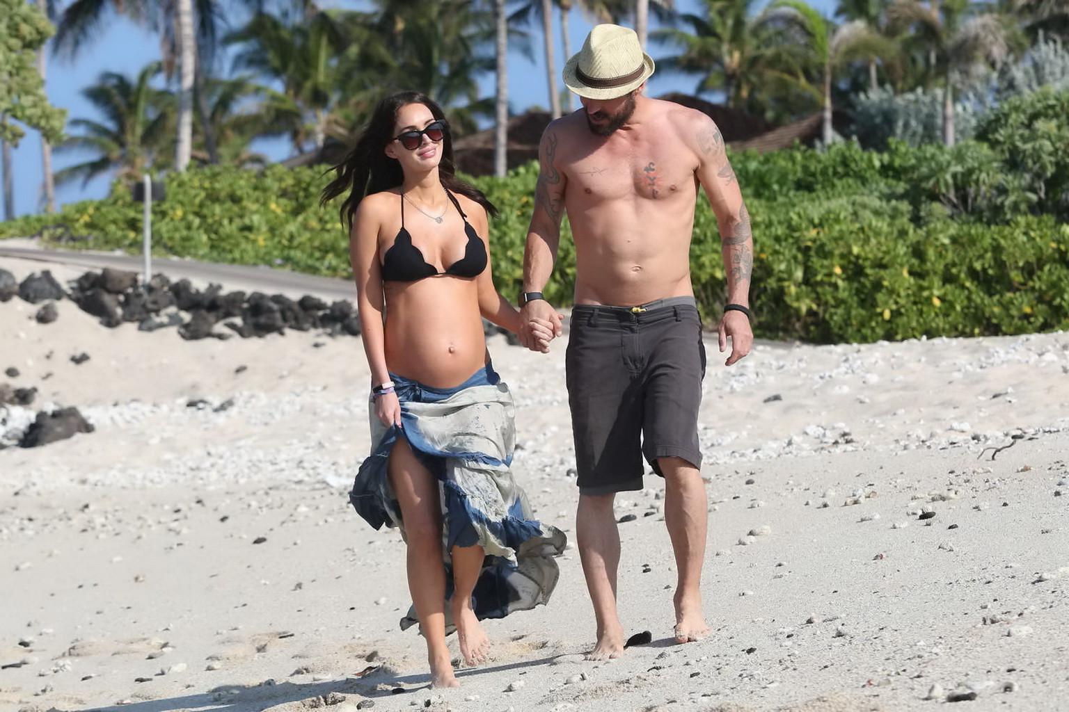 16P Megan Fox showing her boobs and big belly in black bikini