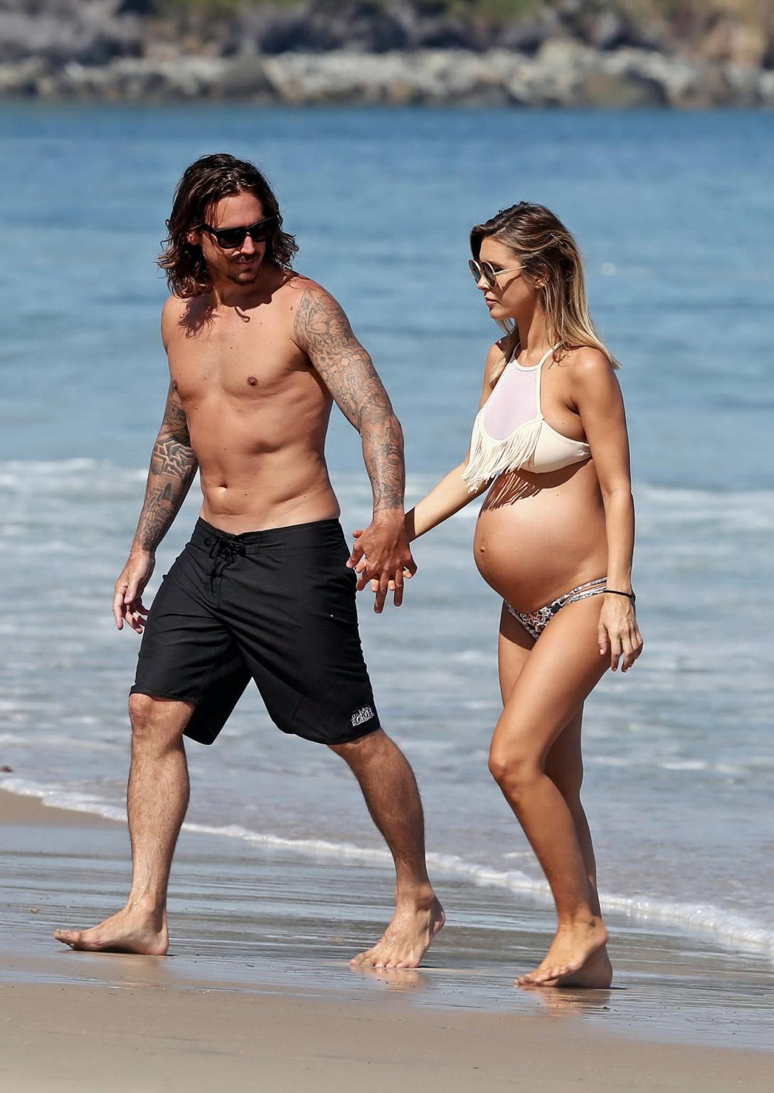 16P Audrina Patridge showing huge belly and boobs in a bikini