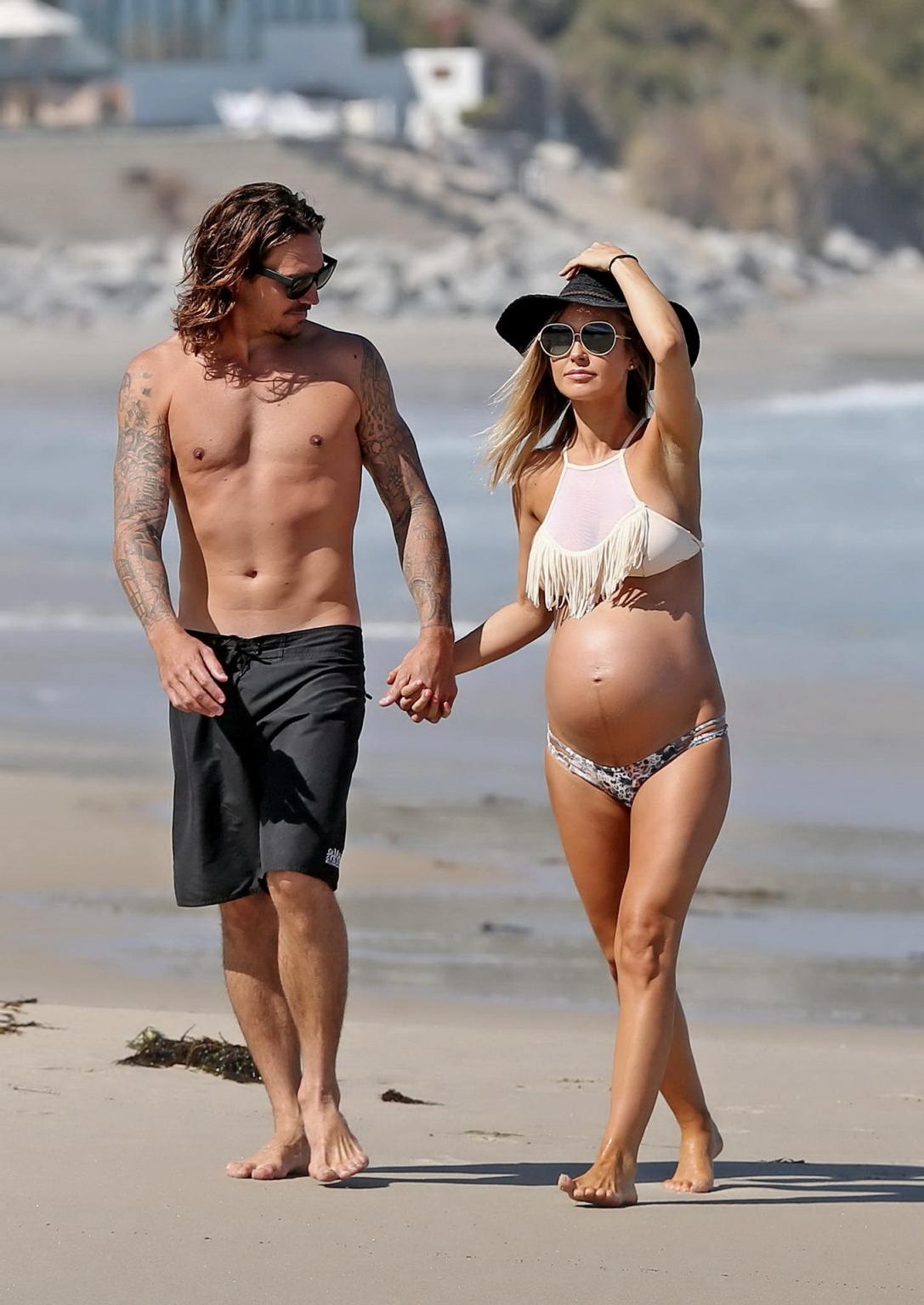 16P Audrina Patridge showing huge belly and boobs in a bikini