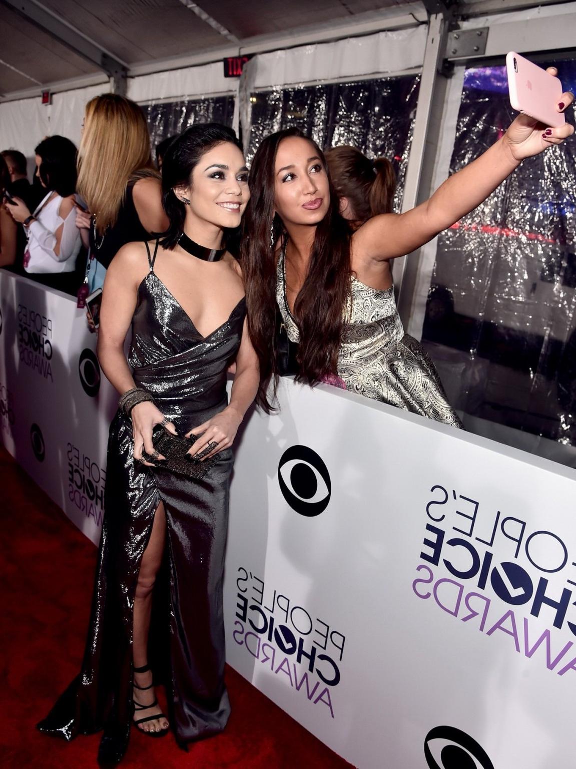 16P Vanessa Hudgens cleavy and leggy in skimpy shiny dress
