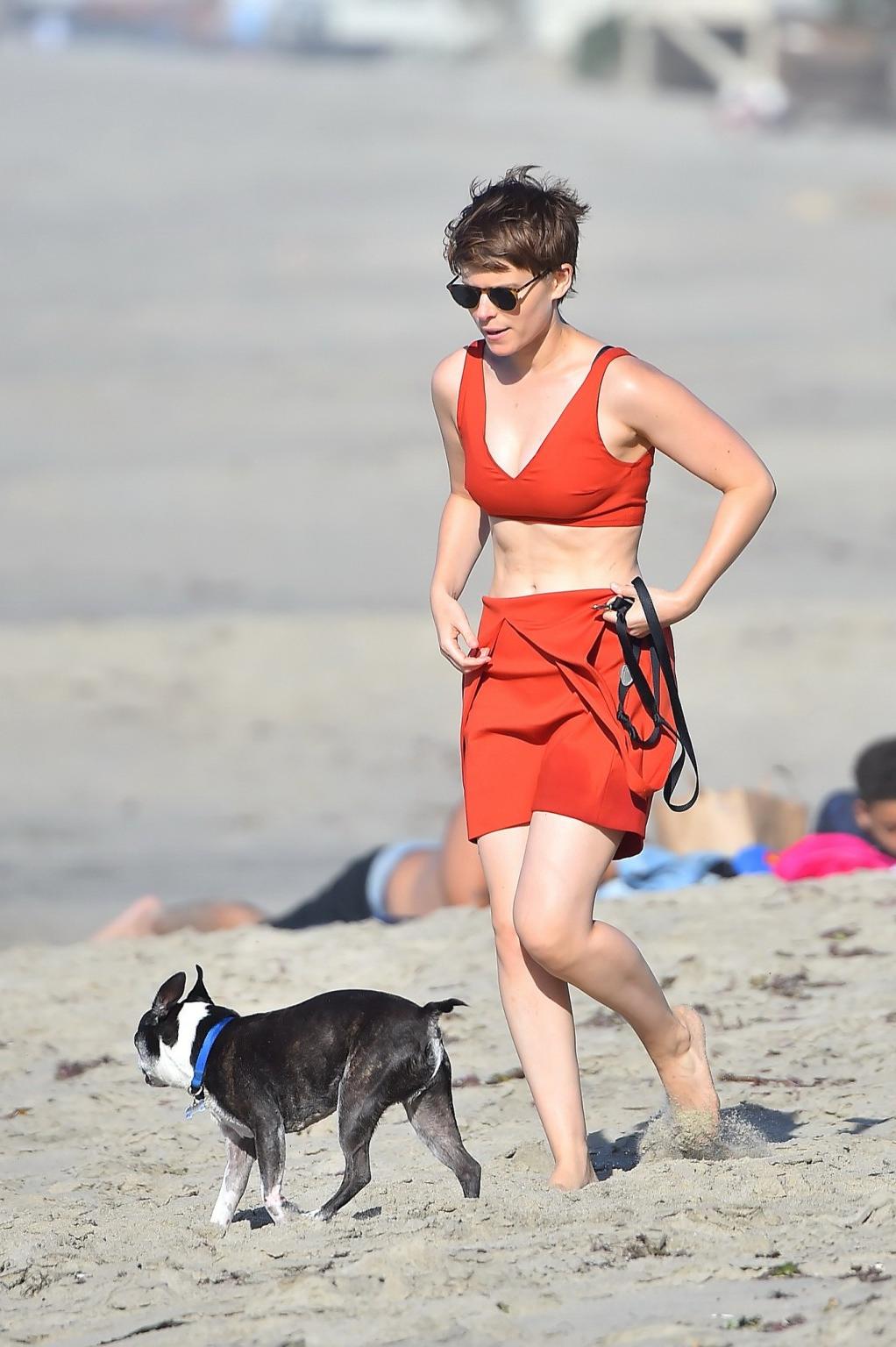 16P Kate Mara busty in belly top and mini skirt at the beach