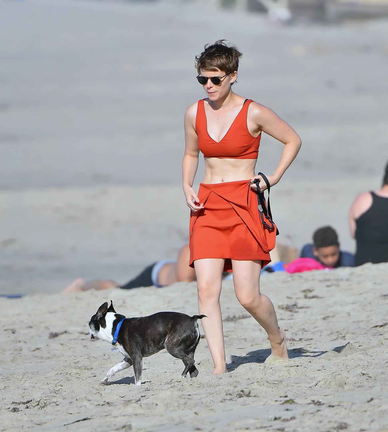 16P Kate Mara busty in belly top and mini skirt at the beach
