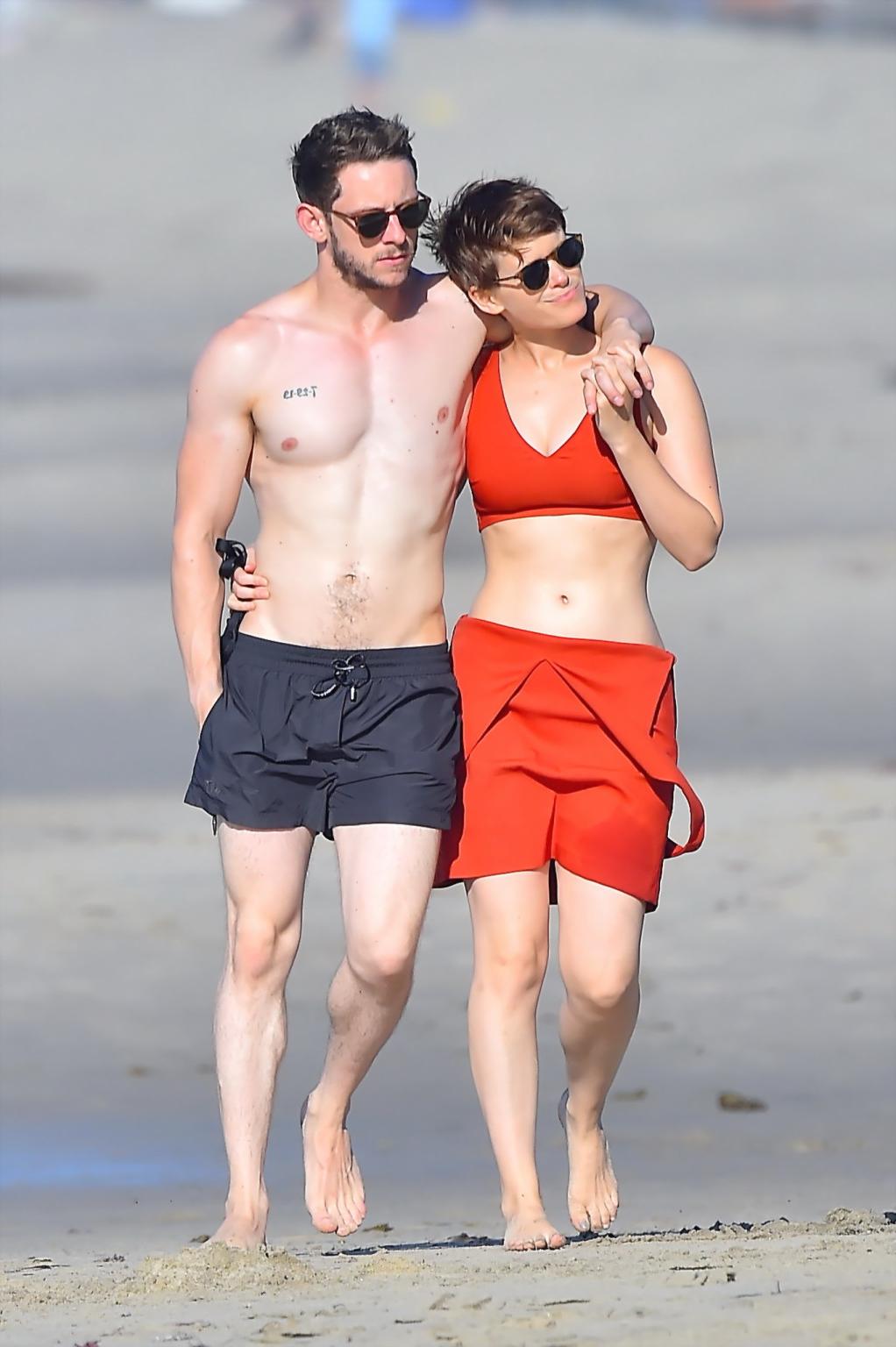 16P Kate Mara busty in belly top and mini skirt at the beach