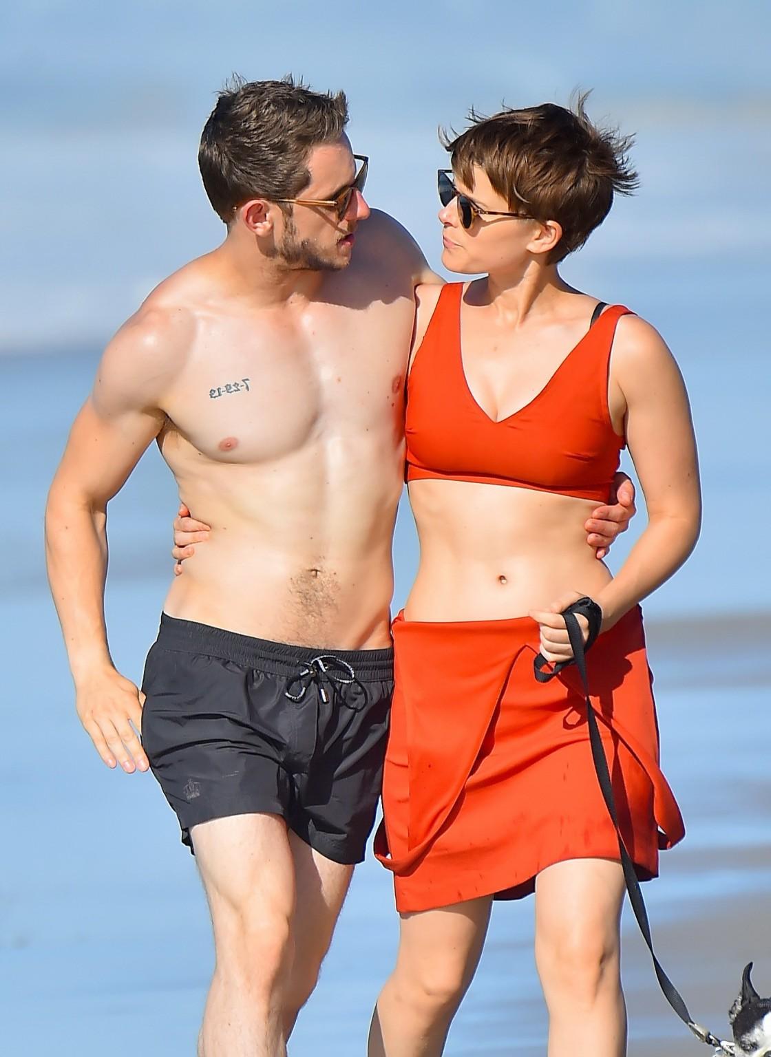 16P Kate Mara busty in belly top and mini skirt at the beach