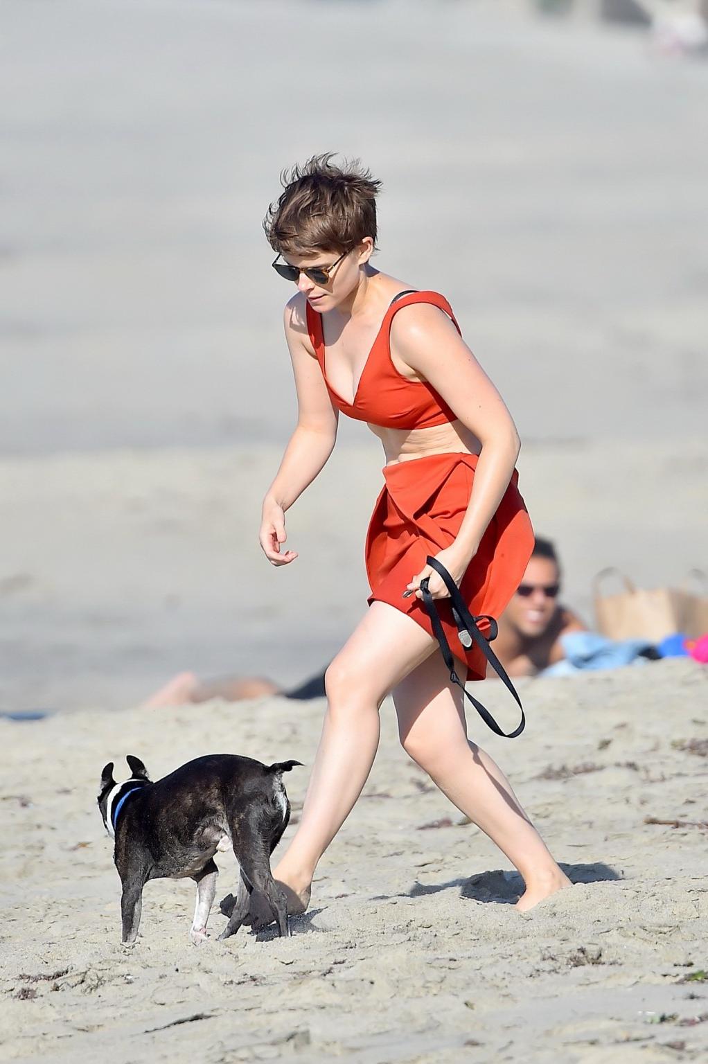 16P Kate Mara busty in belly top and mini skirt at the beach
