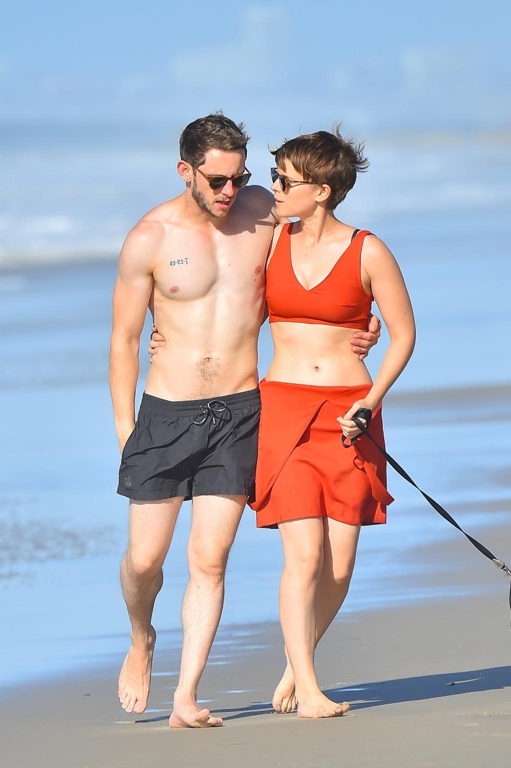 16P Kate Mara busty in belly top and mini skirt at the beach