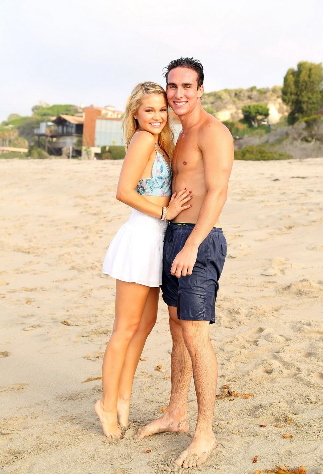 16P Olivia Holt looks hot in belly top and mini skirt for her bday