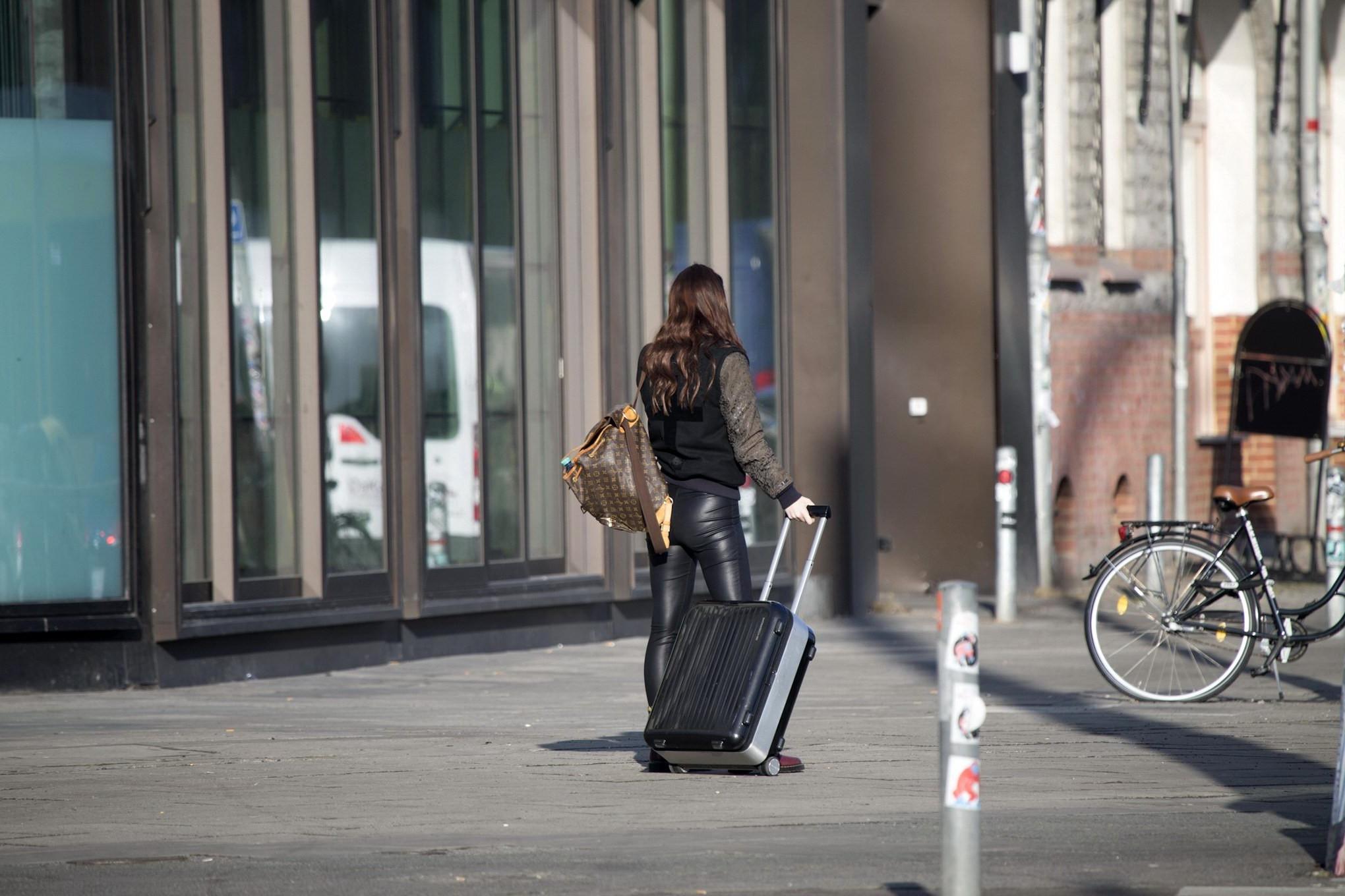 16P Lena MeyerLandrut shows off her legs and ass wearing leather pants out in Berlin