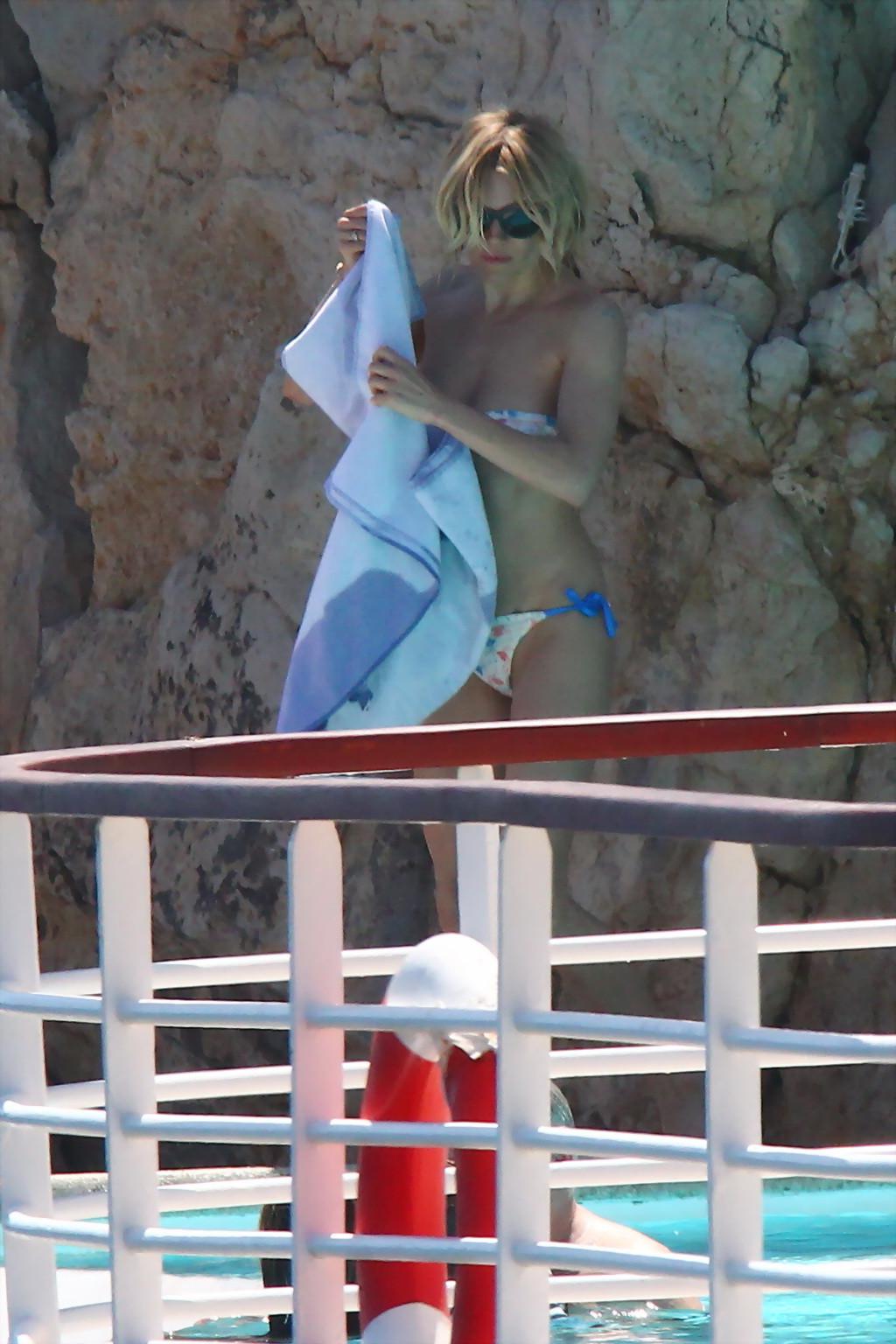 16P Sienna Miller slips out of her tiny strapless bikini at Hotel Du CapEdenRoc pool
