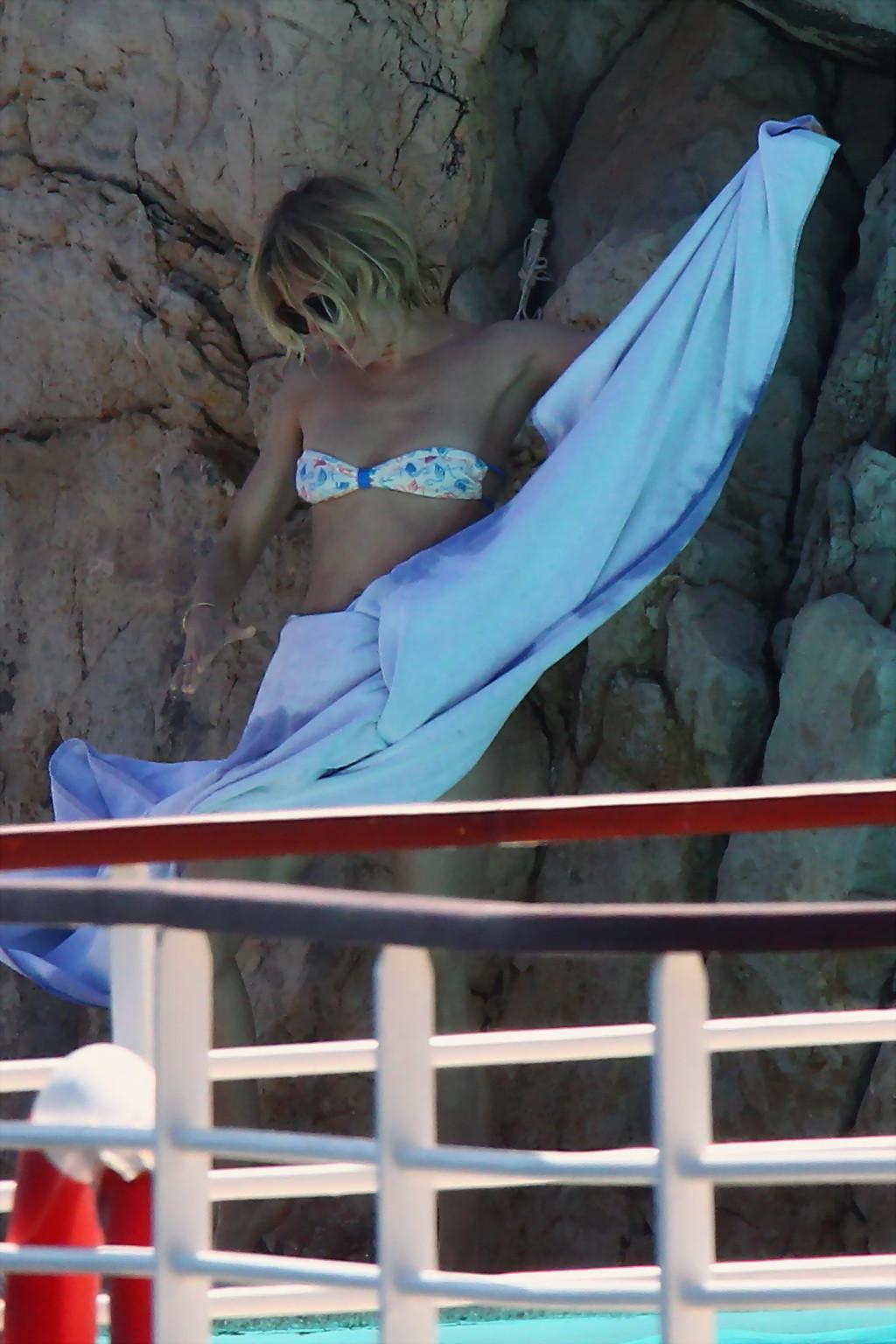 16P Sienna Miller slips out of her tiny strapless bikini at Hotel Du CapEdenRoc pool