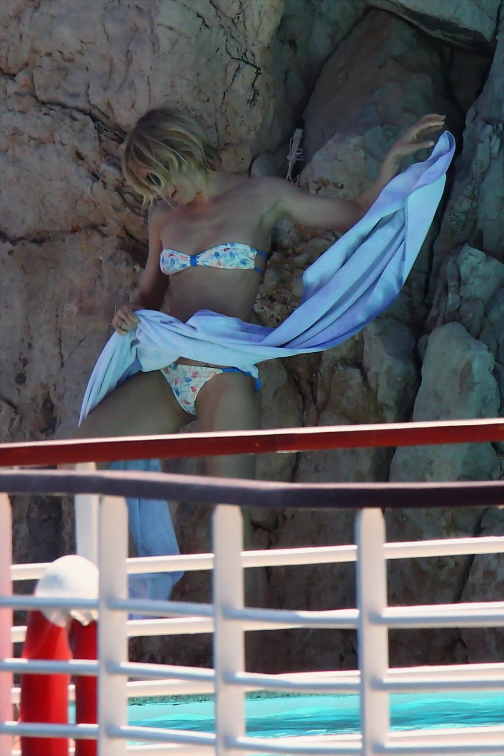 16P Sienna Miller slips out of her tiny strapless bikini at Hotel Du CapEdenRoc pool