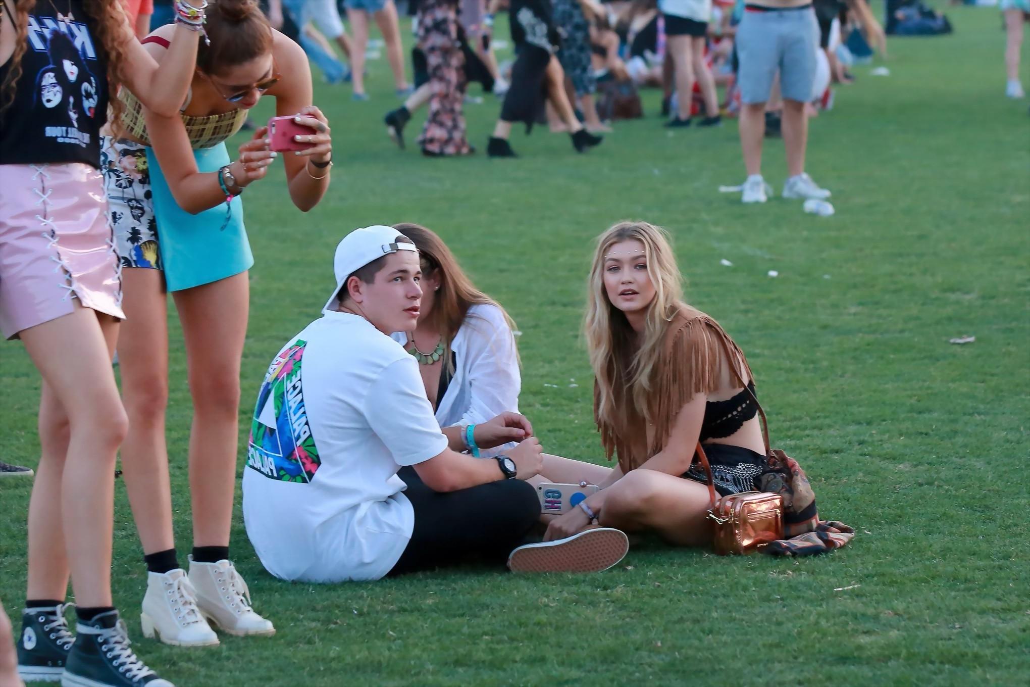 16P Gigi Hadid in shorts and belly top with her hot friends at Coachella Music Festi