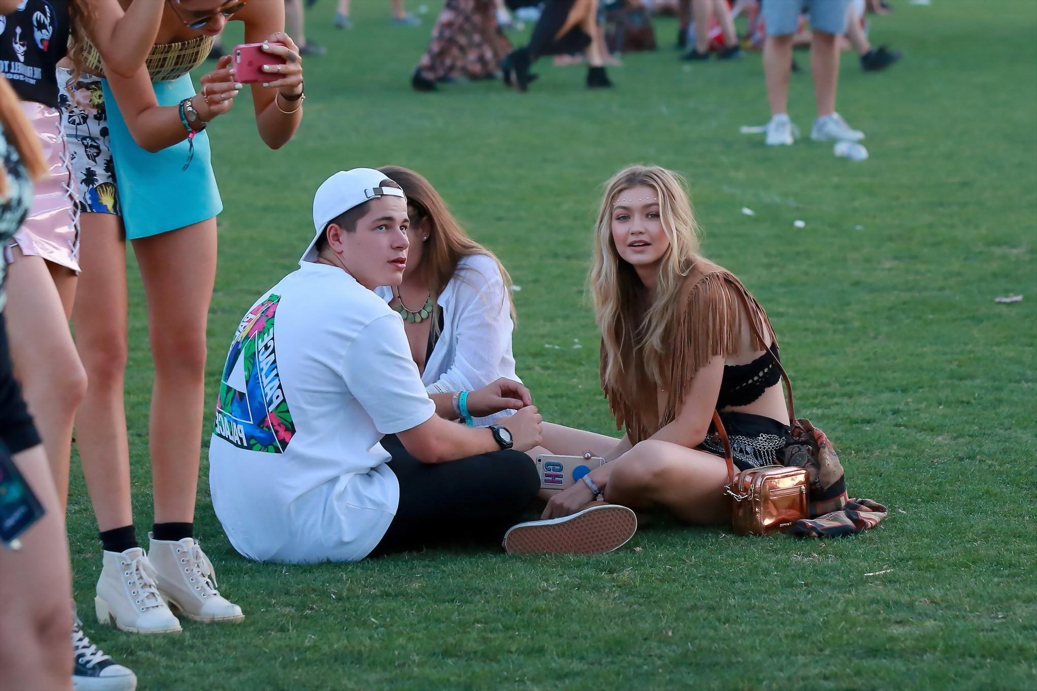 16P Gigi Hadid in shorts and belly top with her hot friends at Coachella Music Festi