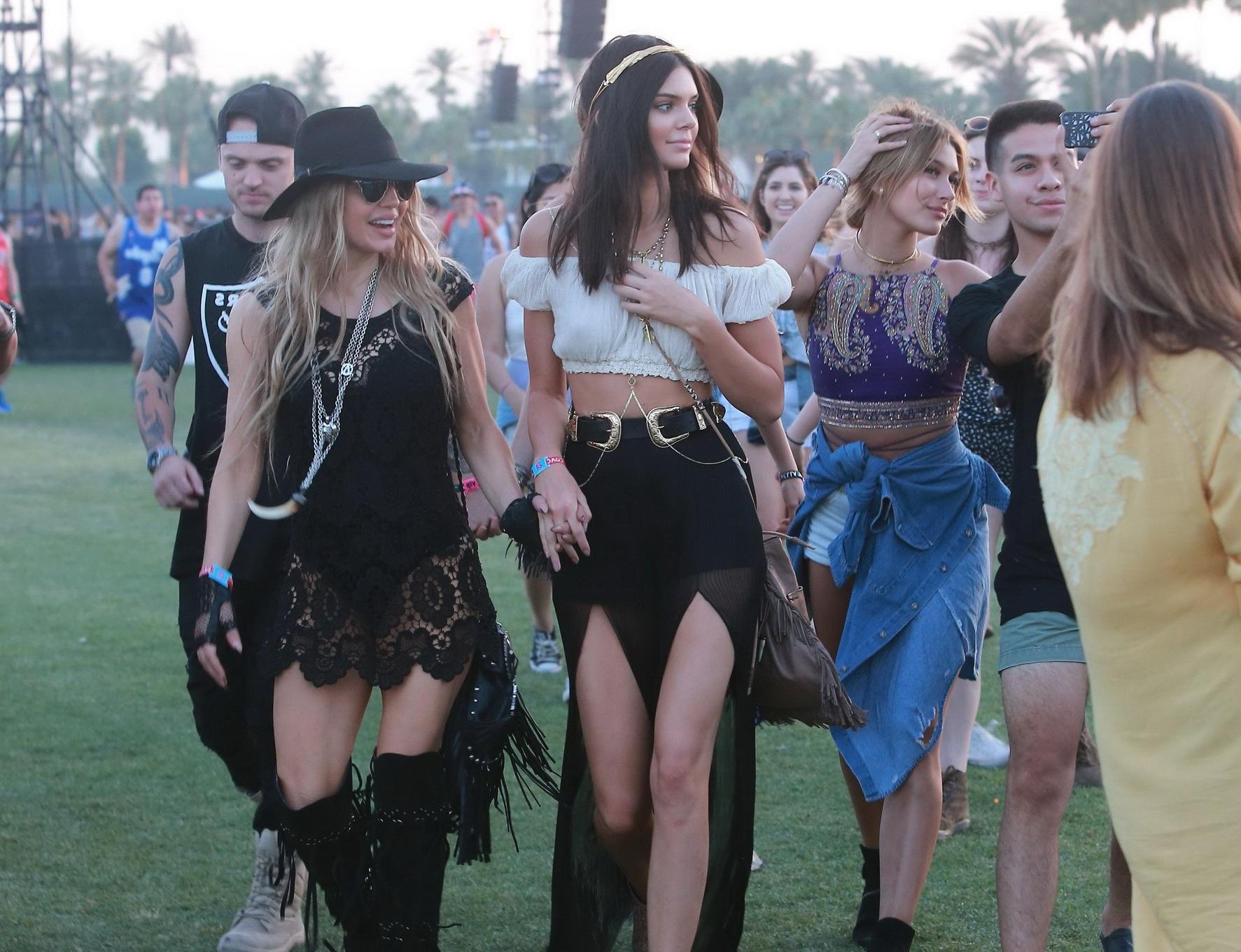 16P Kendall Jenner busty in a seethrough belly top and high slit skirt at Coachella 
