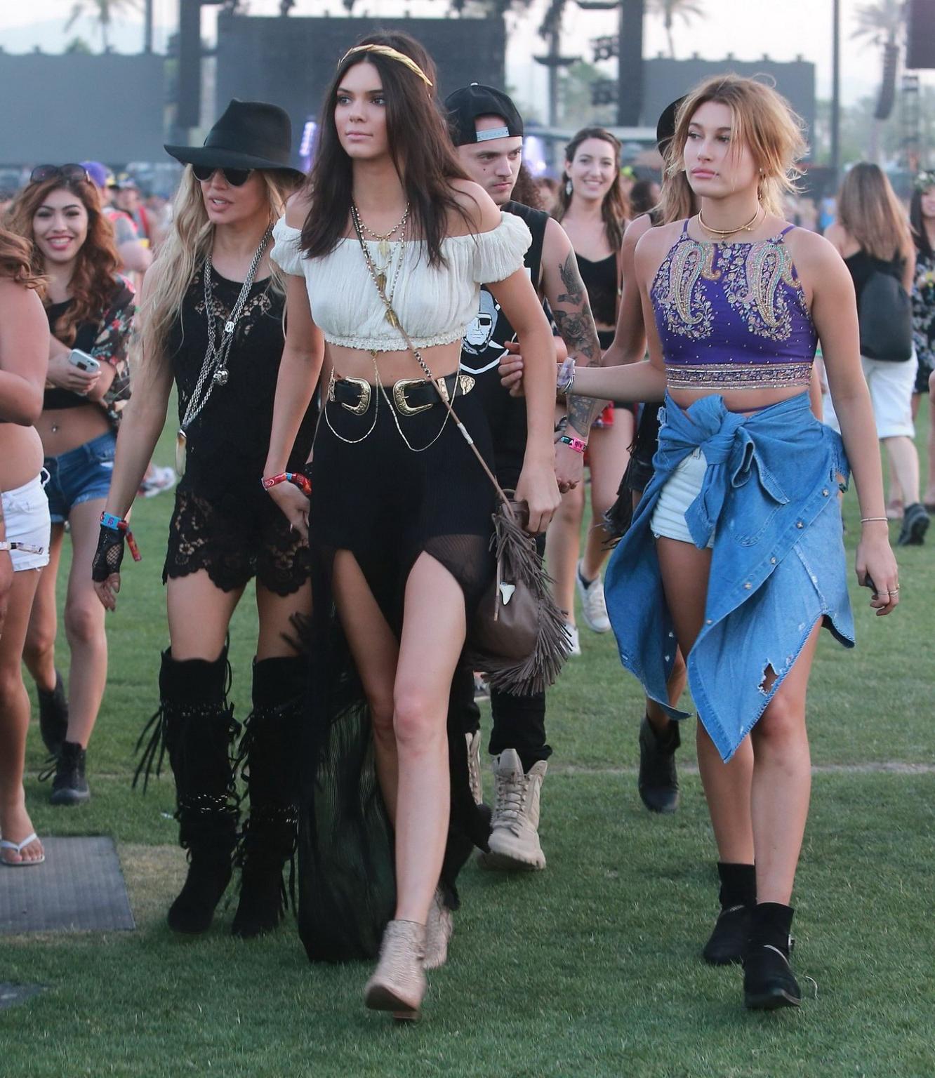 16P Kendall Jenner busty in a seethrough belly top and high slit skirt at Coachella 