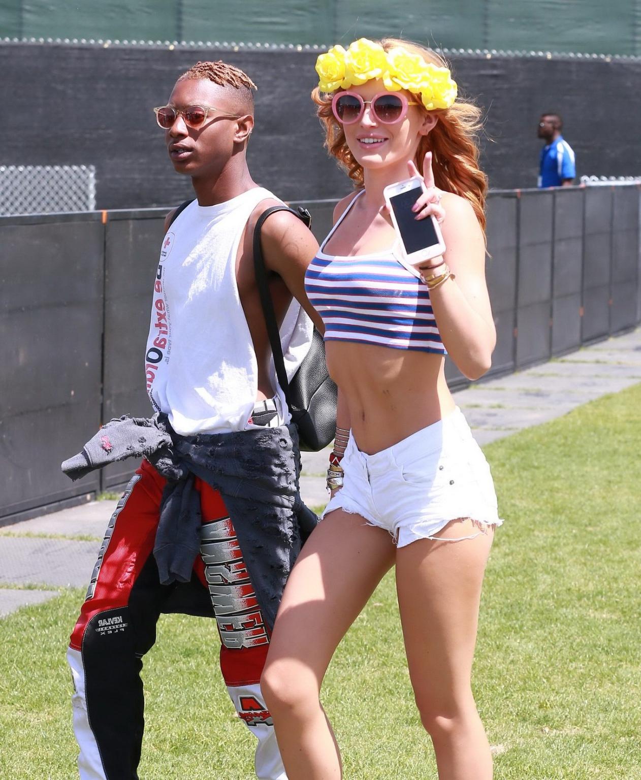 16P Bella Thorne leggy and showing bare midriff in tiny striped belly top and shorts