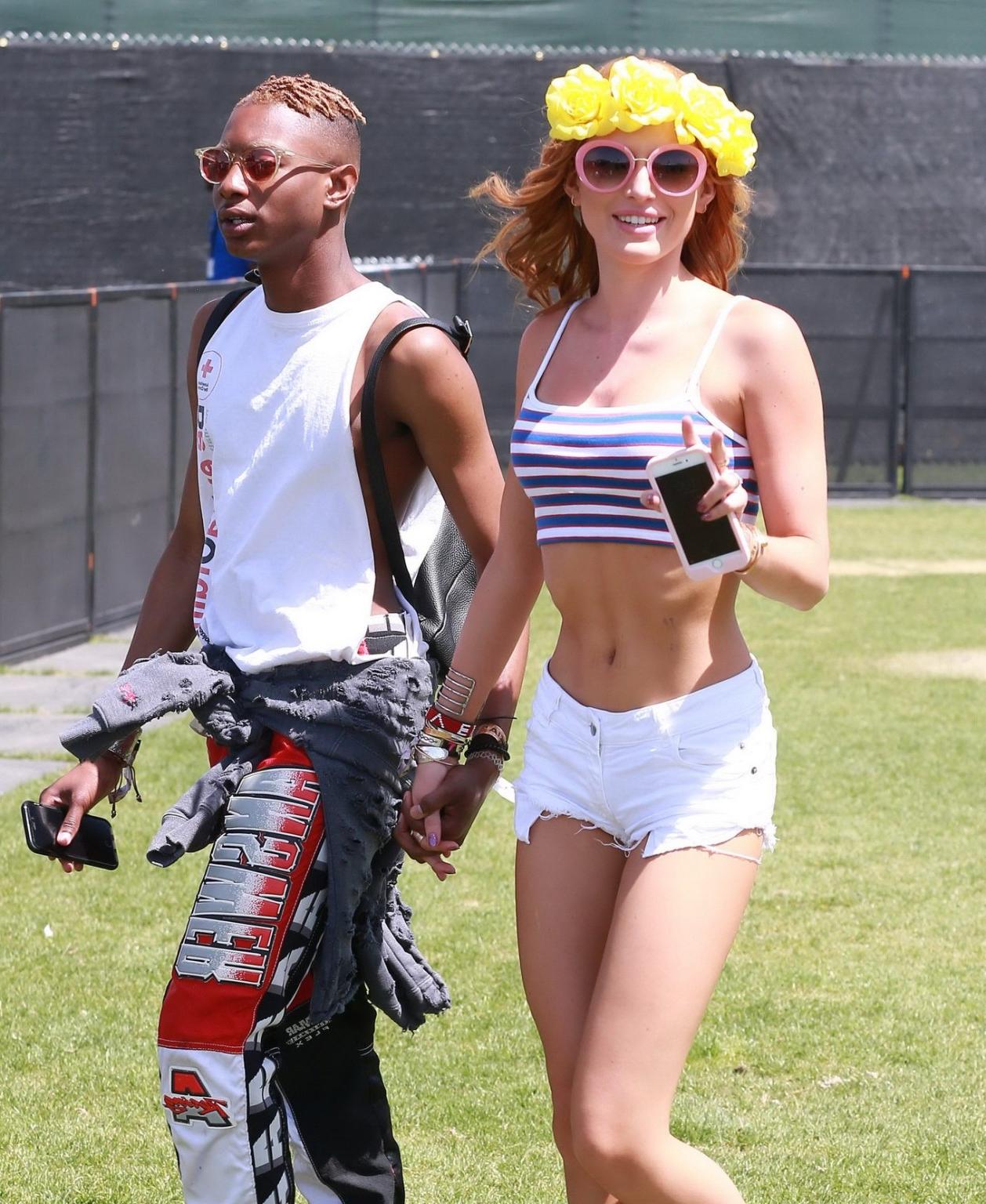 16P Bella Thorne leggy and showing bare midriff in tiny striped belly top and shorts