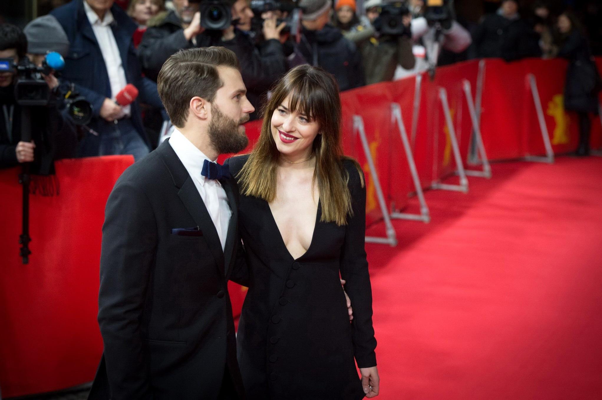 16P Dakota Johnson showing huge cleavage at the Fifty Shades of Grey premiere in Ber