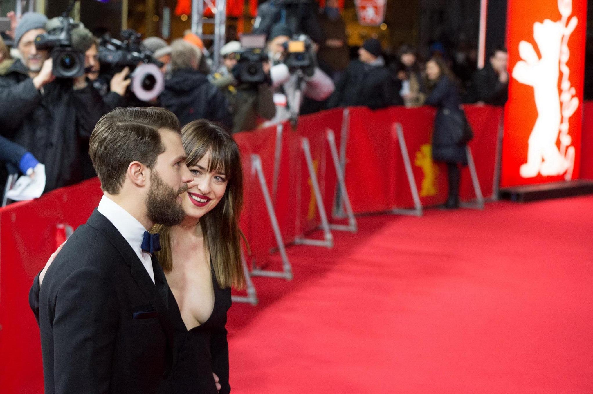 16P Dakota Johnson showing huge cleavage at the Fifty Shades of Grey premiere in Ber