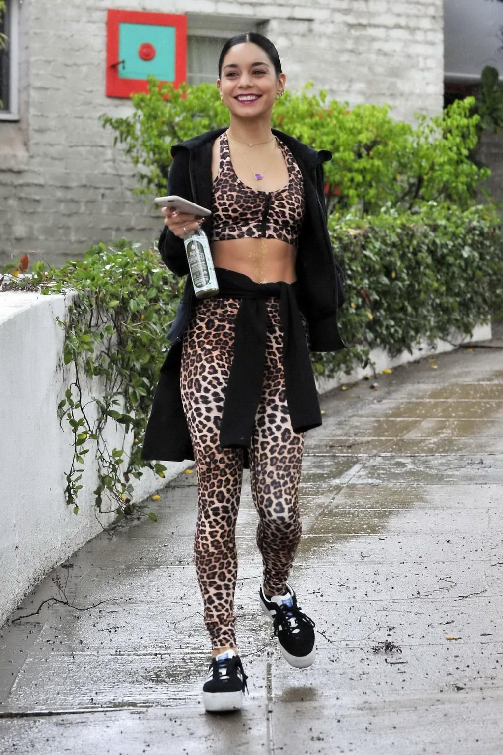 16P Vanessa Hudgens looks hot in leopard print belly top and tights at a rainy day o