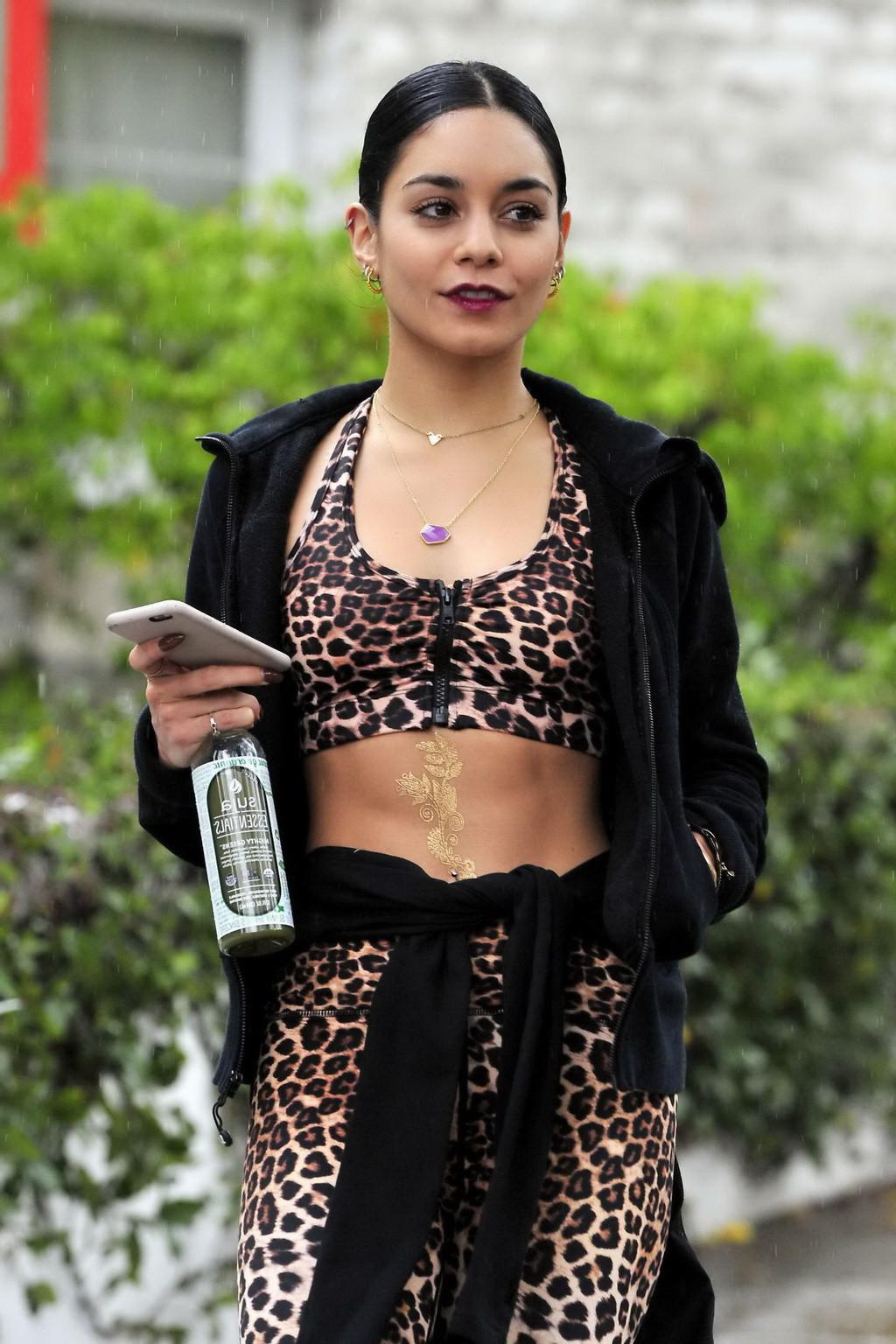 16P Vanessa Hudgens looks hot in leopard print belly top and tights at a rainy day o
