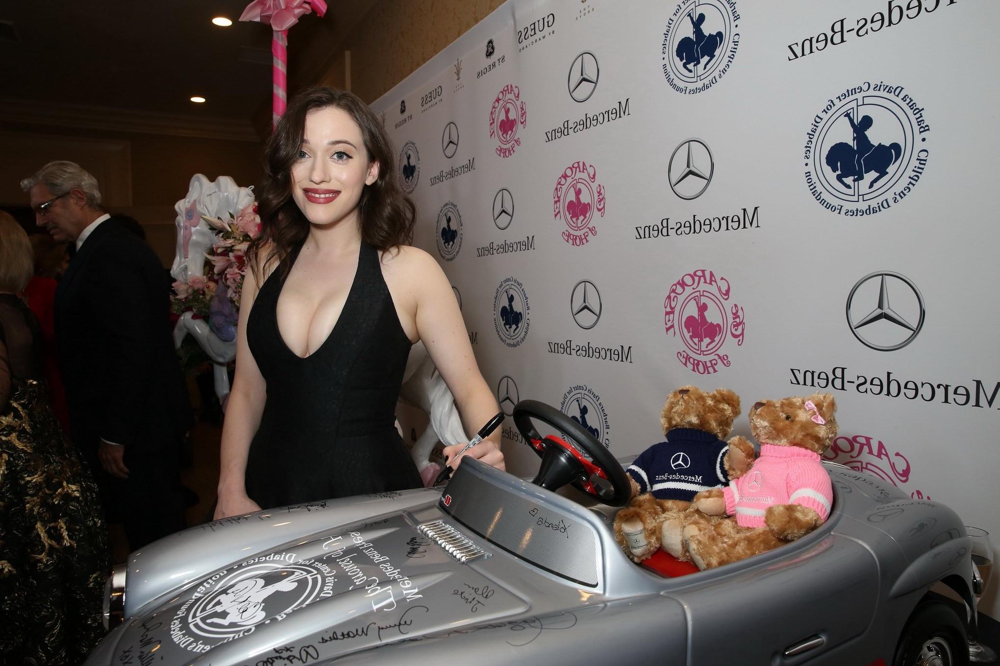 5P Kat Dennings flaunting her huge boobs braless in black low cut dress at 2014 Car