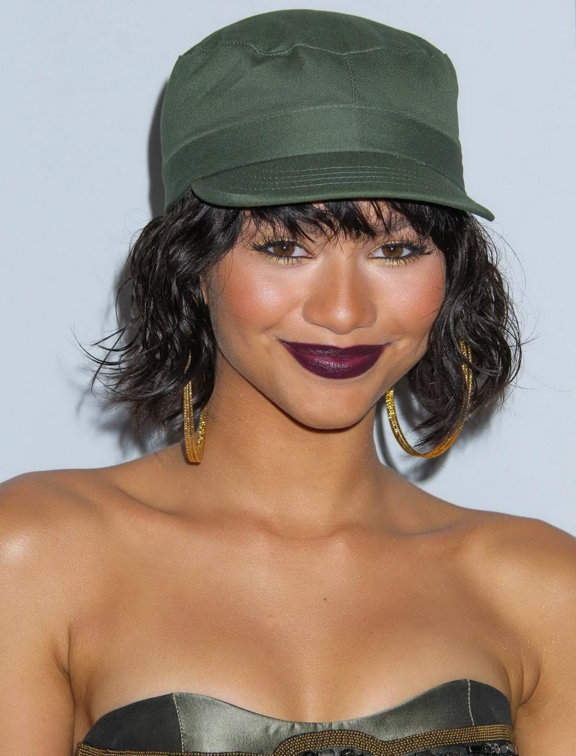 16P Zendaya Coleman shows off her boobs in a tiny belly top at BMI RB Hip Hop Awards