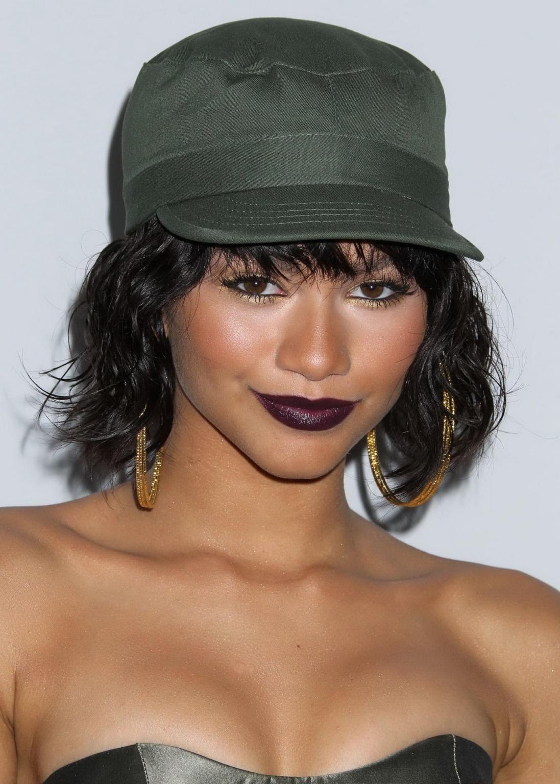 16P Zendaya Coleman shows off her boobs in a tiny belly top at BMI RB Hip Hop Awards