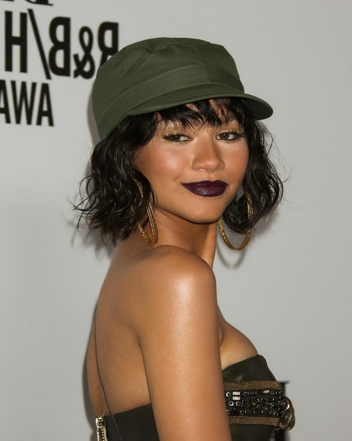 16P Zendaya Coleman shows off her boobs in a tiny belly top at BMI RB Hip Hop Awards