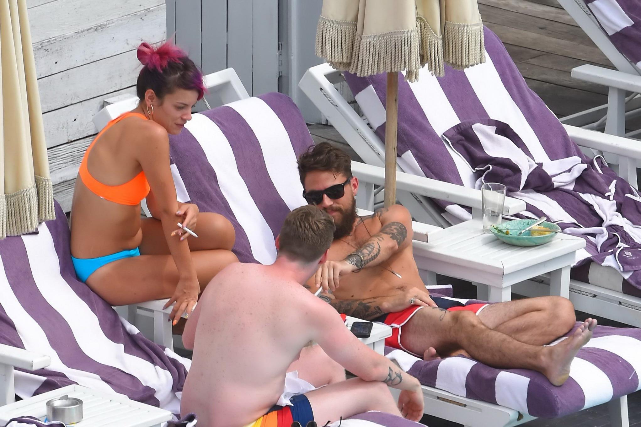 15P Lily Allen in a bikini showing pokies and pussy at the hotel pool in New York