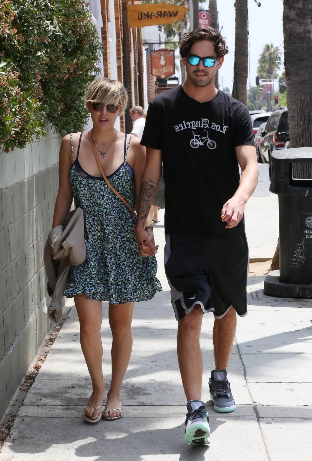 16P Kaley Cuoco boasting in her full bra all over Los Angeles