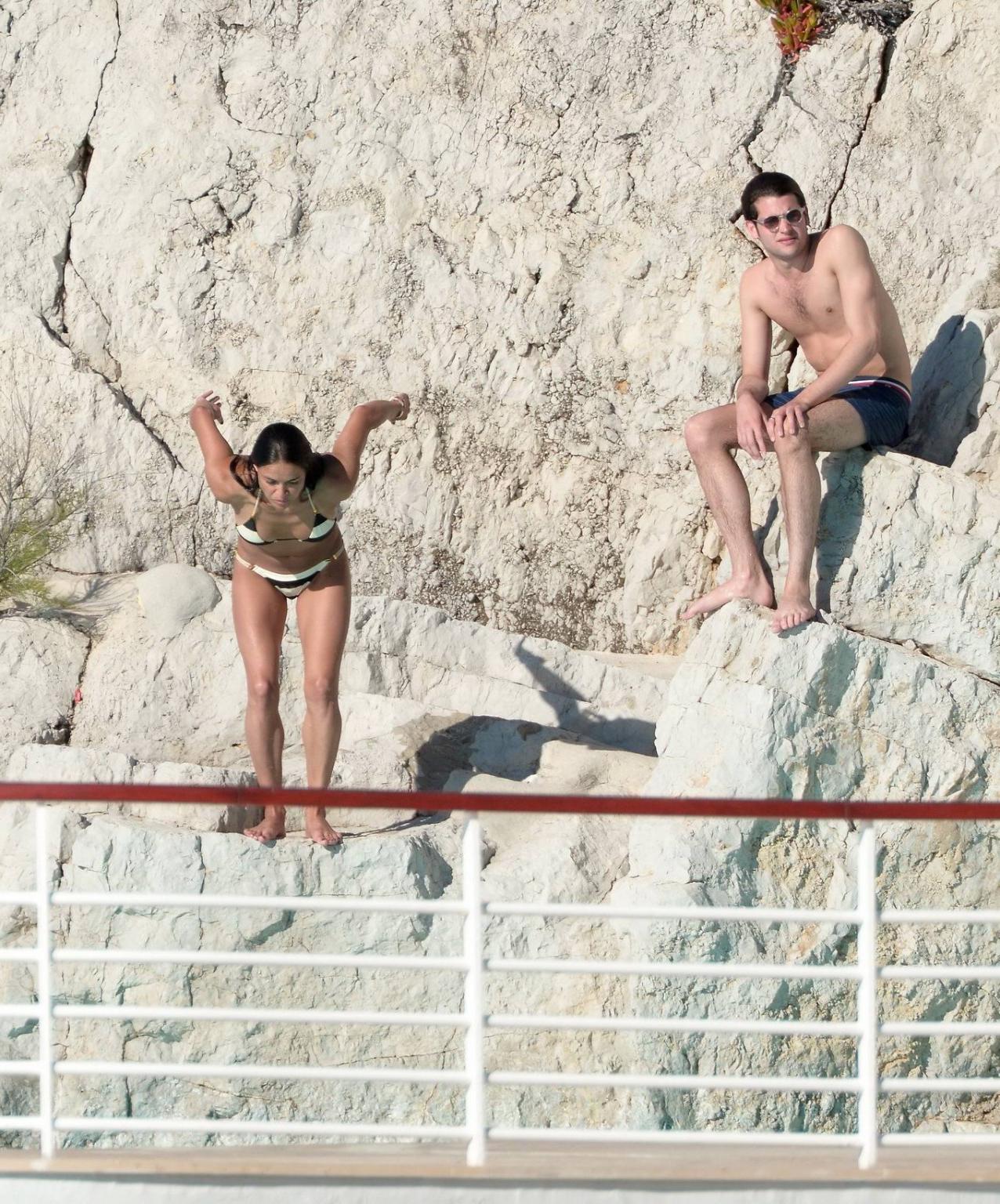 16P Michelle Rodriguez busty in a tiny striped bikini at the Hotel Du CapEdenRoc poo