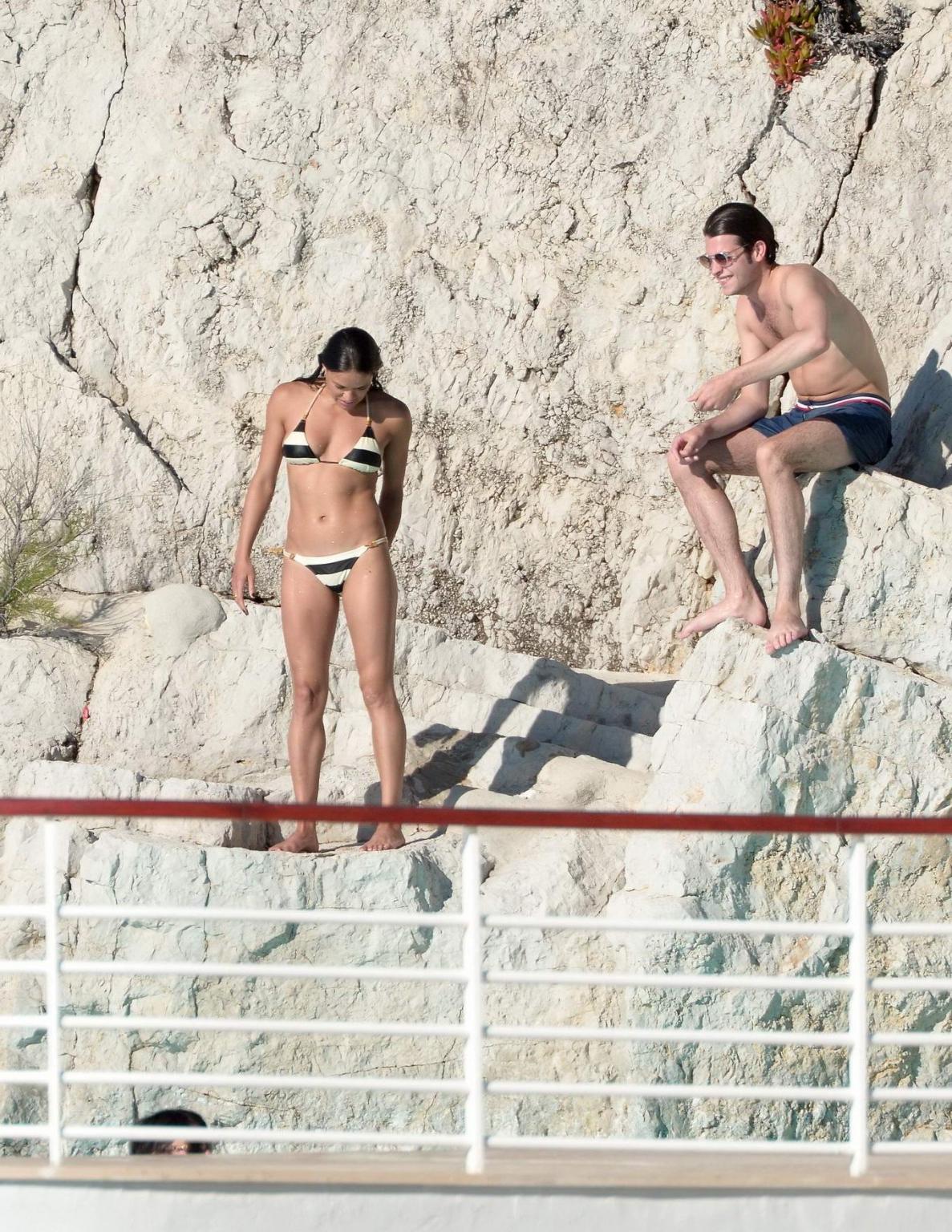 16P Michelle Rodriguez busty in a tiny striped bikini at the Hotel Du CapEdenRoc poo