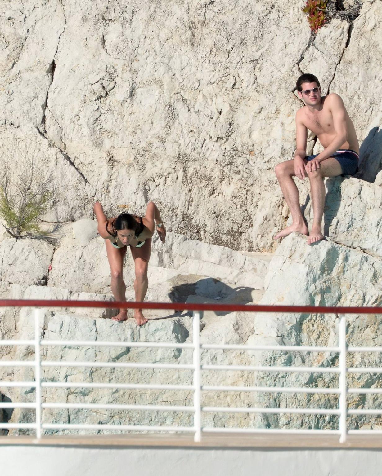 16P Michelle Rodriguez busty in a tiny striped bikini at the Hotel Du CapEdenRoc poo