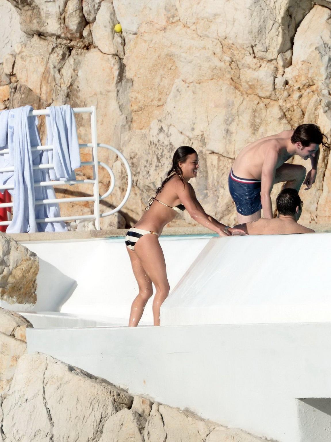 16P Michelle Rodriguez busty in a tiny striped bikini at the Hotel Du CapEdenRoc poo