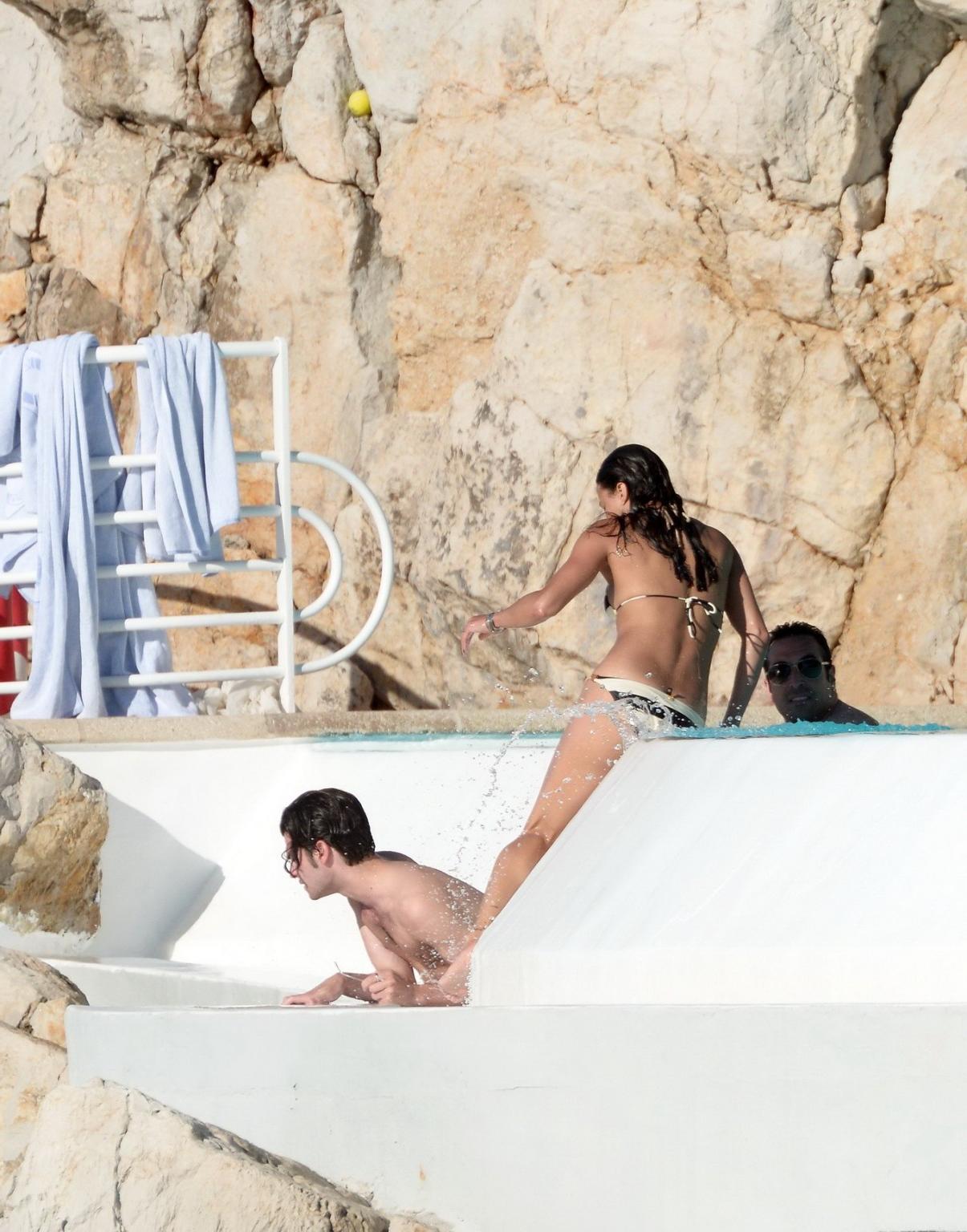 16P Michelle Rodriguez busty in a tiny striped bikini at the Hotel Du CapEdenRoc poo