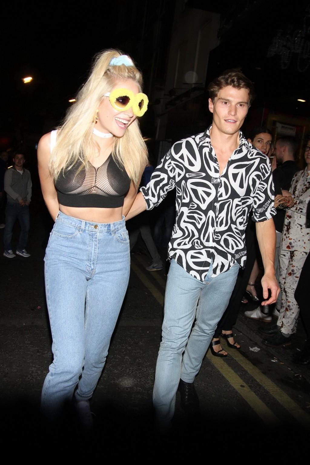 16P Pixie Lott showing her big boobs in a seethru belly top while leaving Madam Jojo