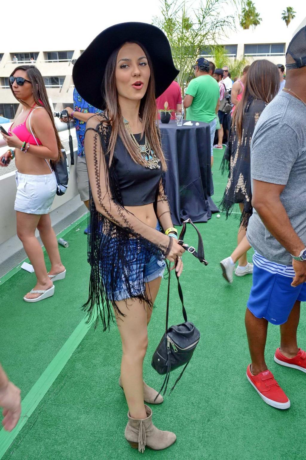 16P Victoria Justice wearing denim shorts and belly top at the Hard Rock Hotel Pool 