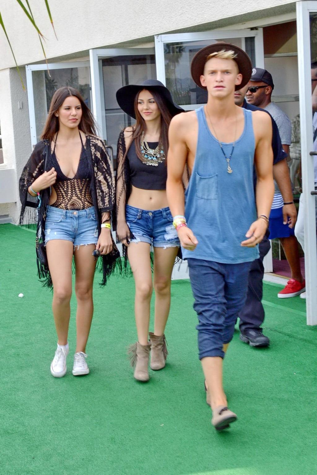 16P Victoria Justice wearing denim shorts and belly top at the Hard Rock Hotel Pool 