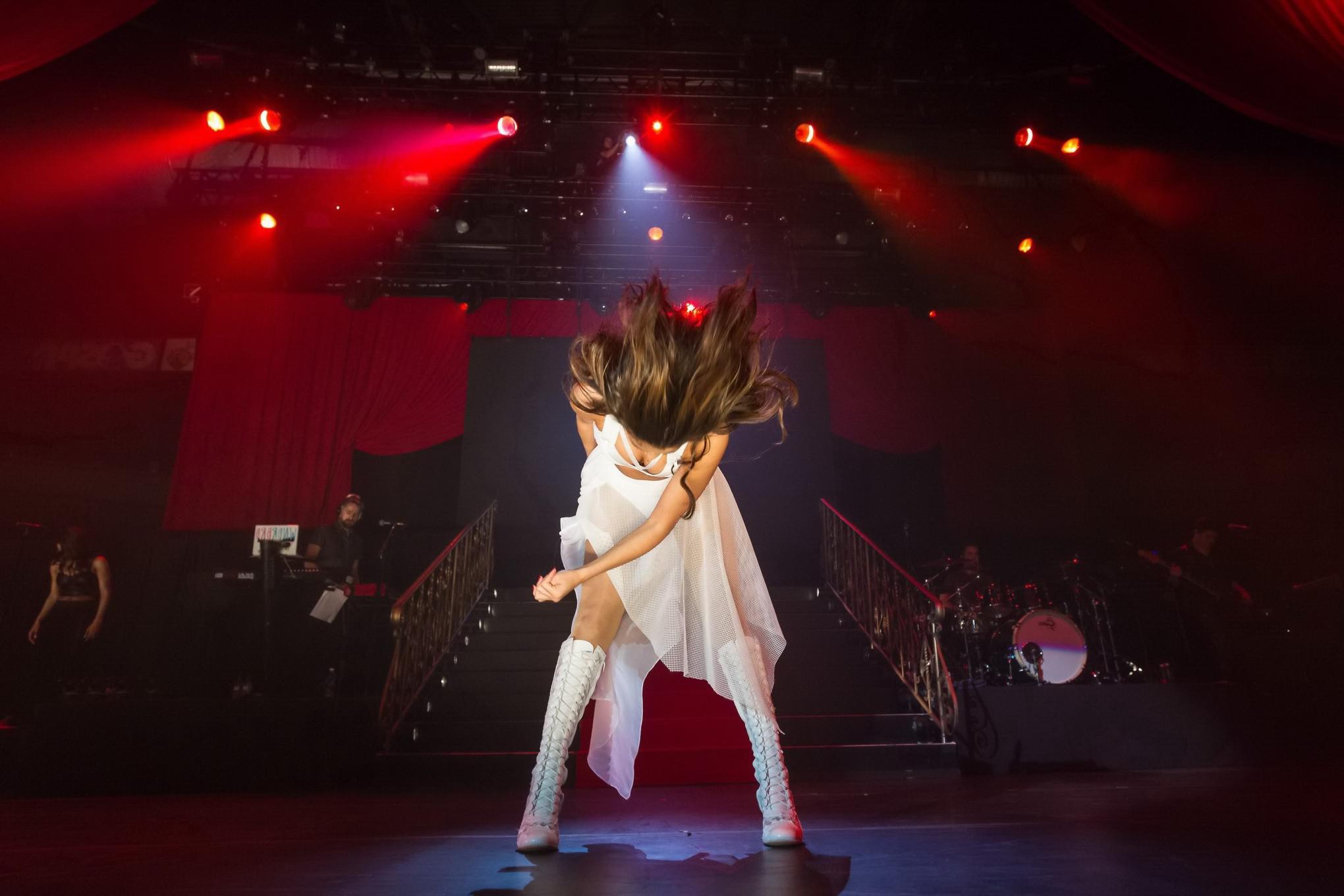 16P Selena Gomez wearing tiny white belly top and see-through skirt while performs a