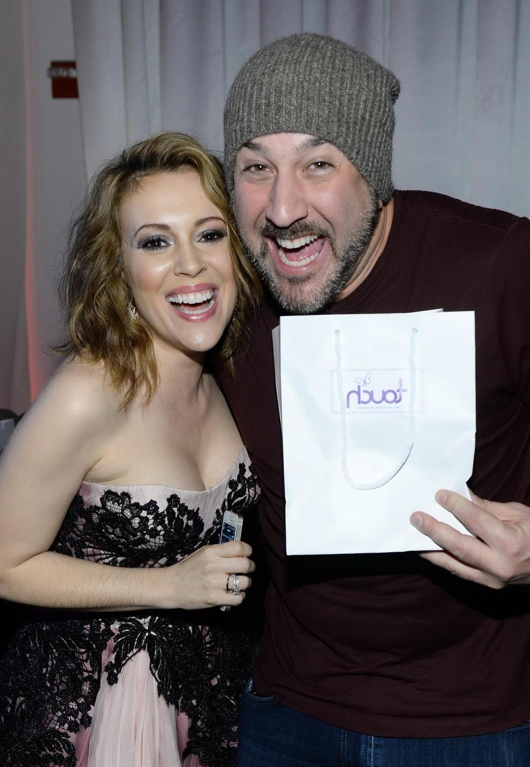 16P Busty Alyssa Milano wearing a strapless dress at the Maxim Big Game Weekend in N
