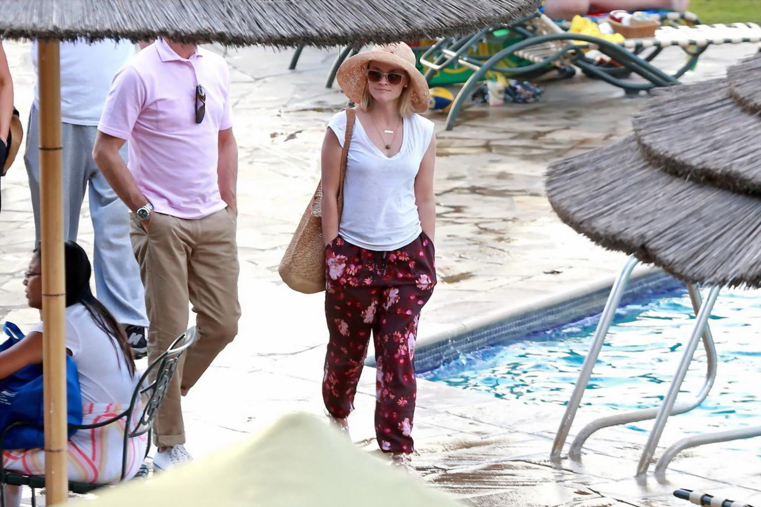 16P Reese Witherspoon tanning in skimpy pink tube bikini at her hotel in Hawaii