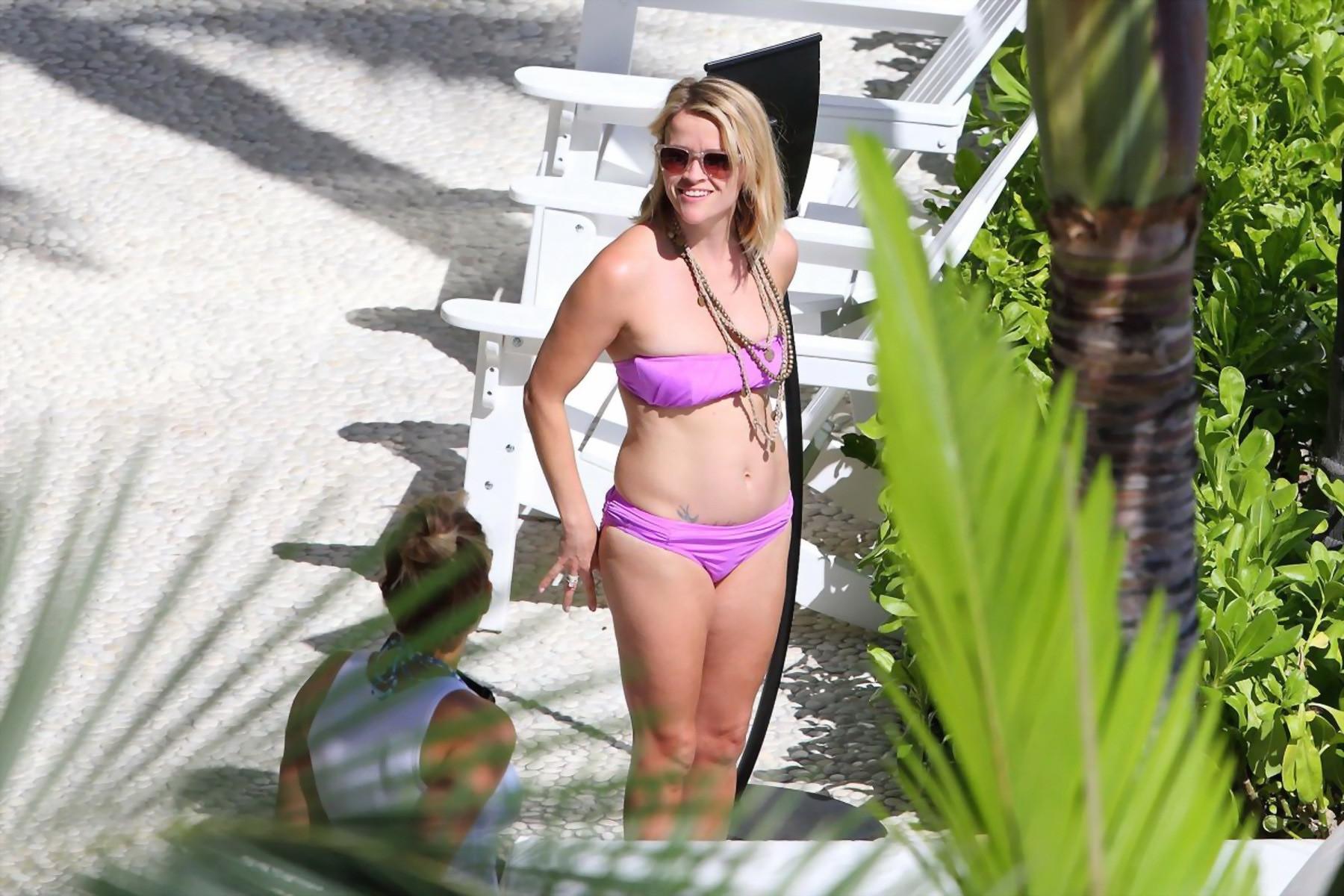 16P Reese Witherspoon tanning in skimpy pink tube bikini at her hotel in Hawaii