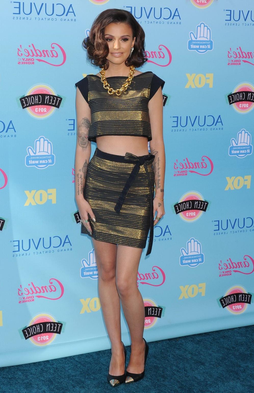 16P Cher Lloyd wearing shiny striped belly top and mini skirt at 2013 Teen Choice Aw