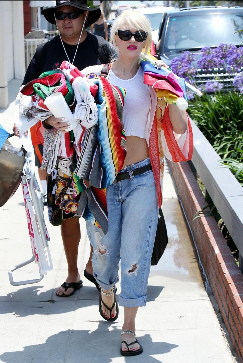 16P Gwen Stefani busty wearing see-through to bra belly top and jeans in Long Beach