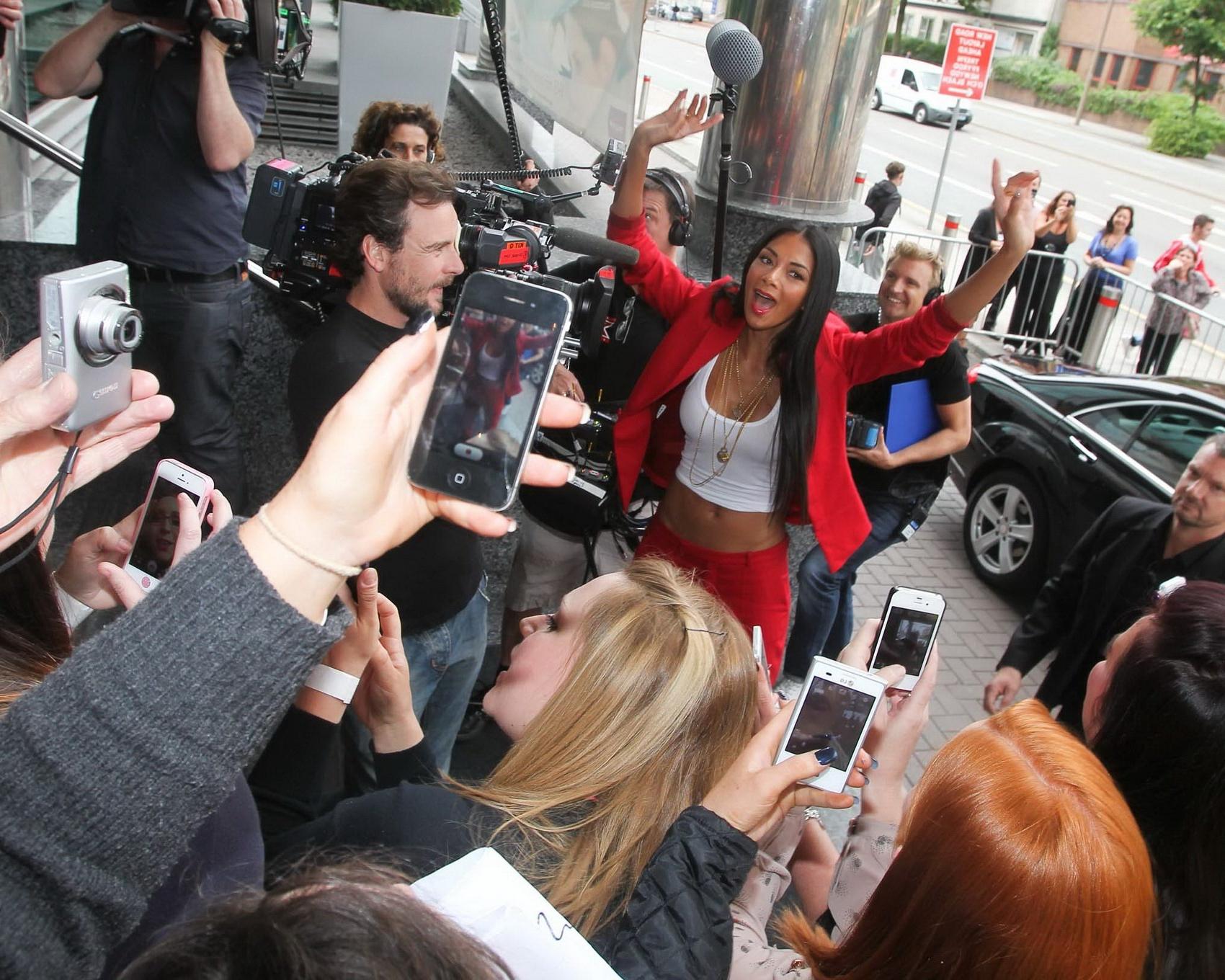 16P Nicole Scherzinger braless in a hot red suit and white belly top while arriving 