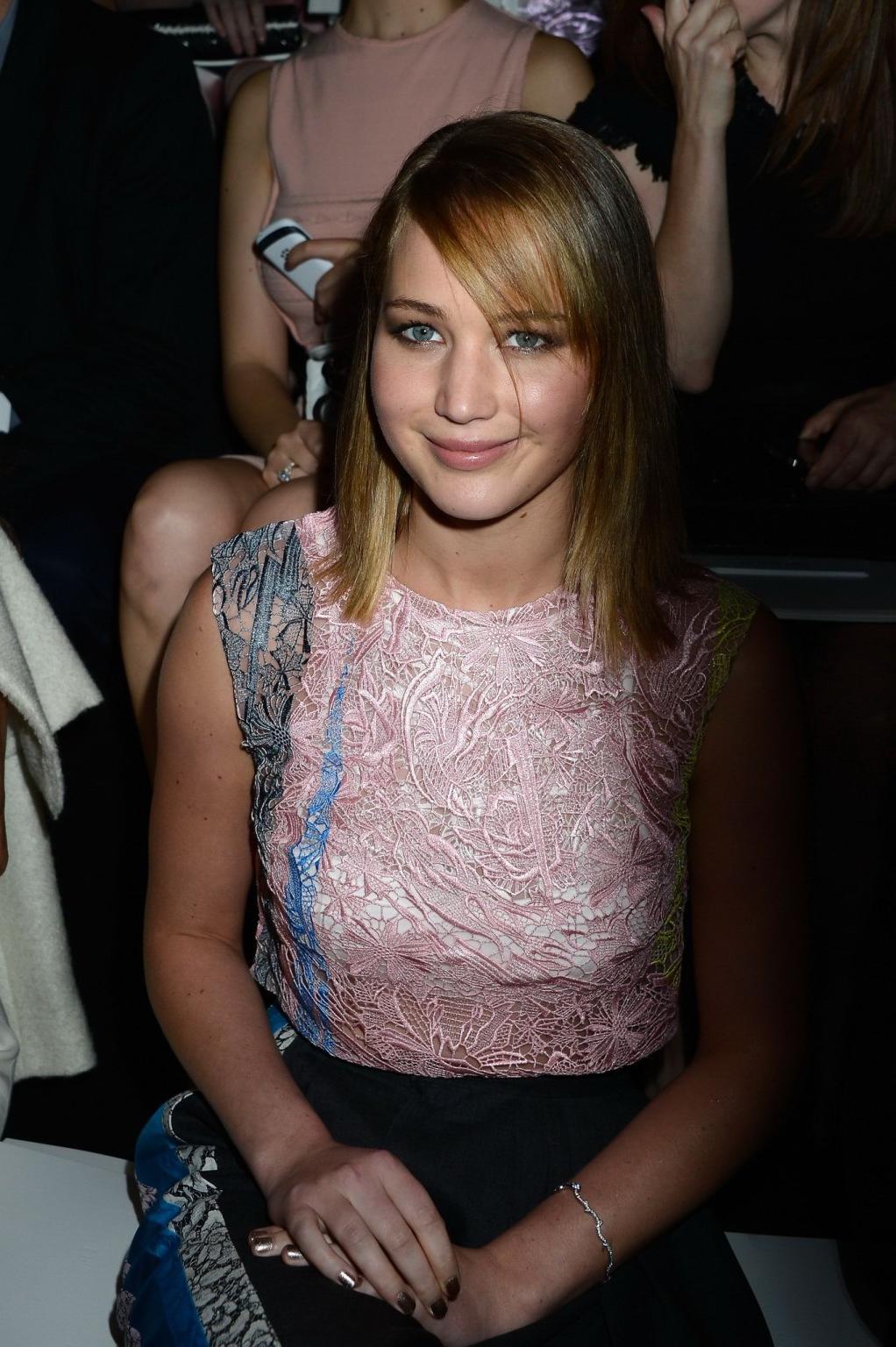 16P Jennifer Lawrence wearing see-through to bra belly top and fancy pants at the Ch