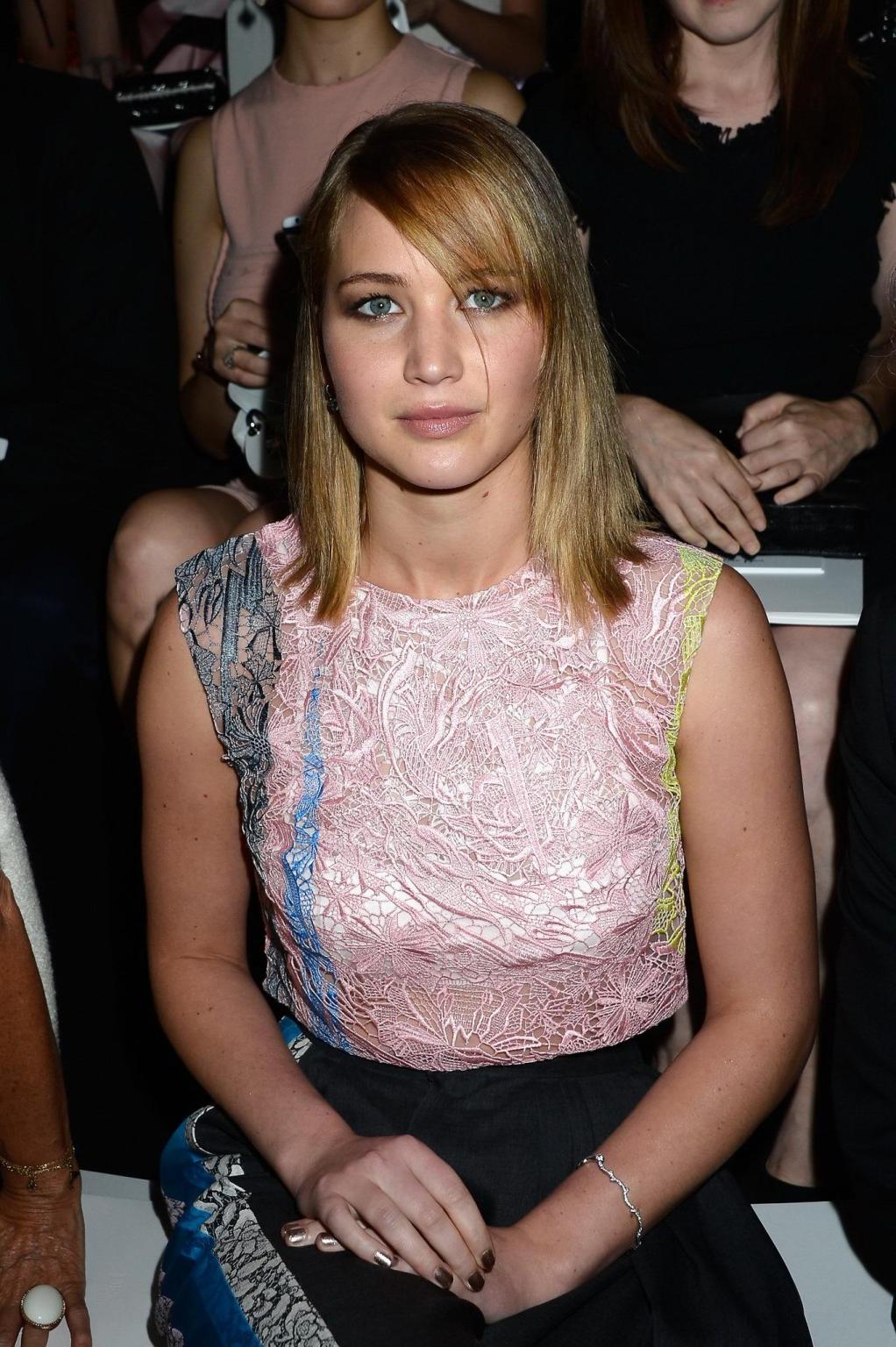 16P Jennifer Lawrence wearing see-through to bra belly top and fancy pants at the Ch