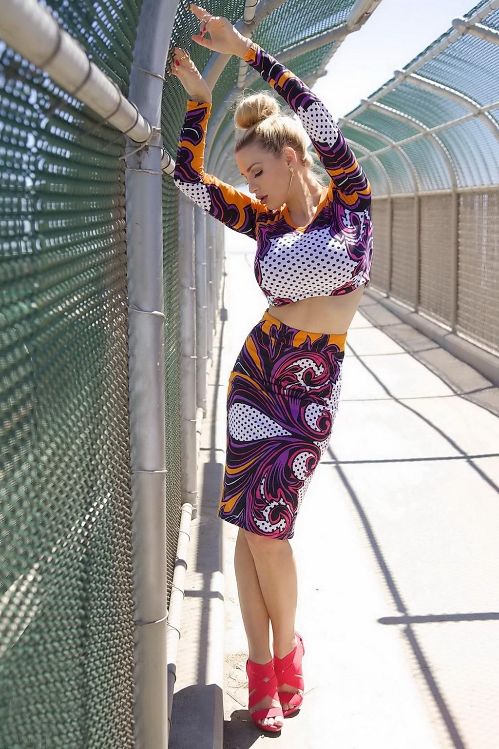 15P Jordan Carver exposing her curvy body in a belly top and mini skirt at Bridge Bi