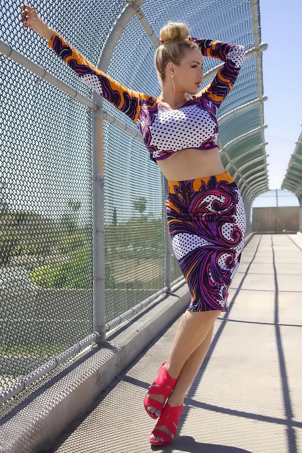 15P Jordan Carver exposing her curvy body in a belly top and mini skirt at Bridge Bi